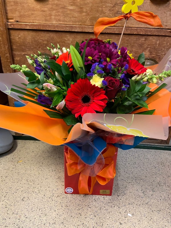 Hand tied Aqua Bouquet in water