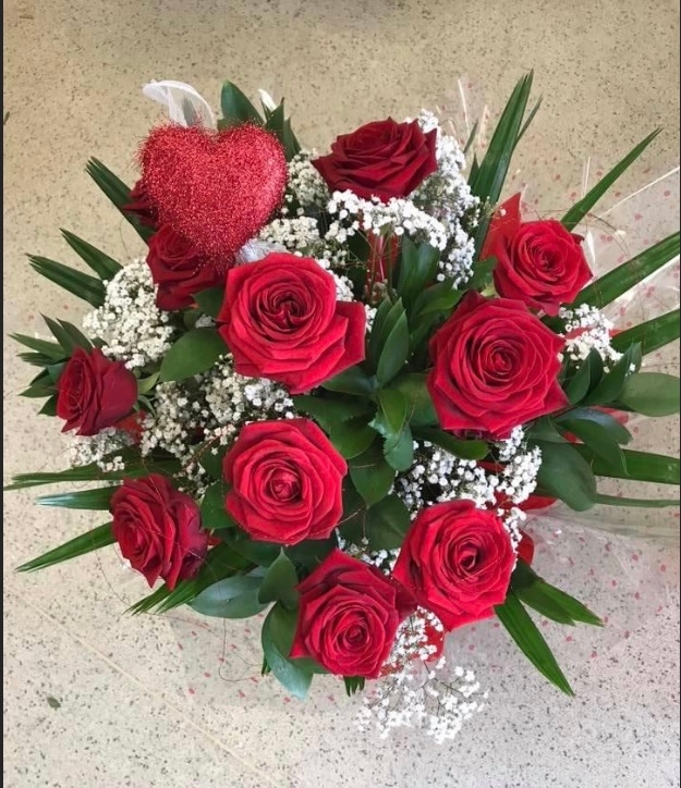 12 Red Roses Hand Tied in water Bouquet