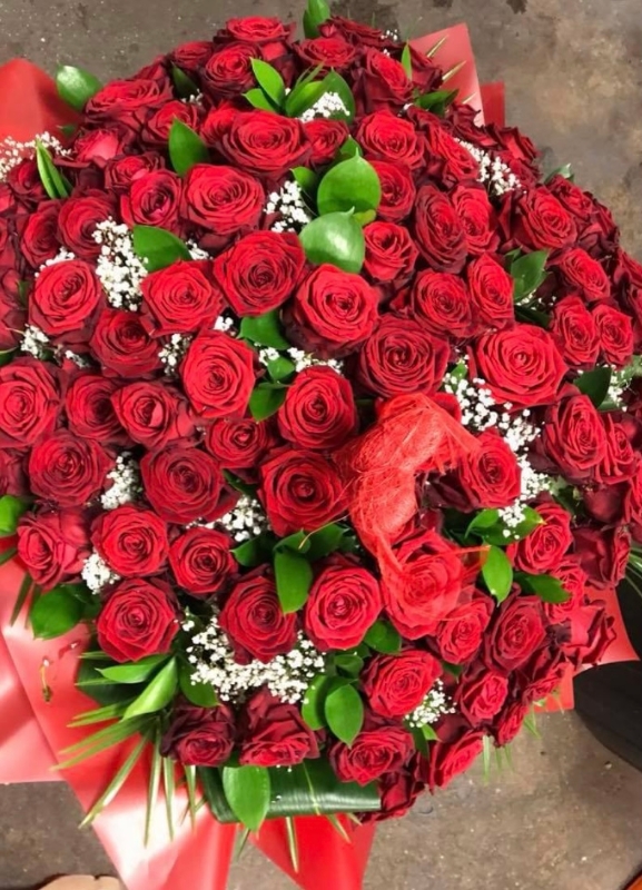 12 Red Roses Hand Tied in water Bouquet