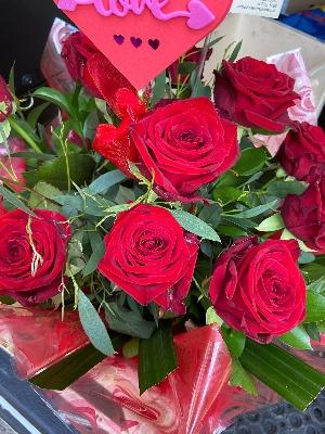 12 Red Roses Hand Tied in water Bouquet