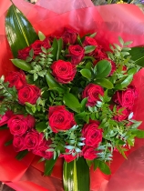 12 Red Roses Hand Tied in water Bouquet
